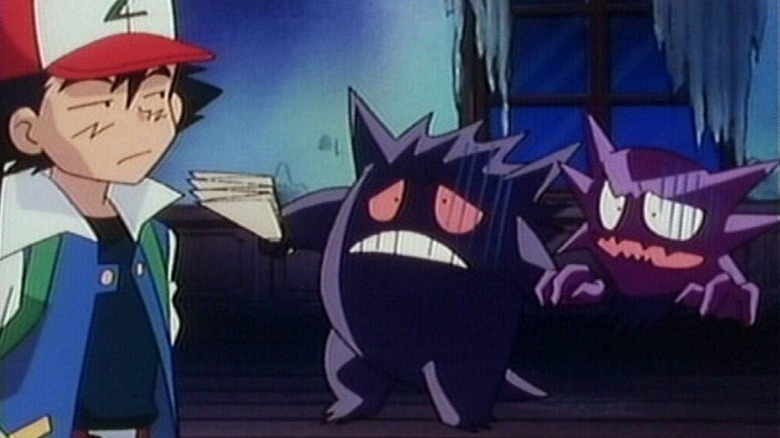 Ash looking at Gengar and Haunter