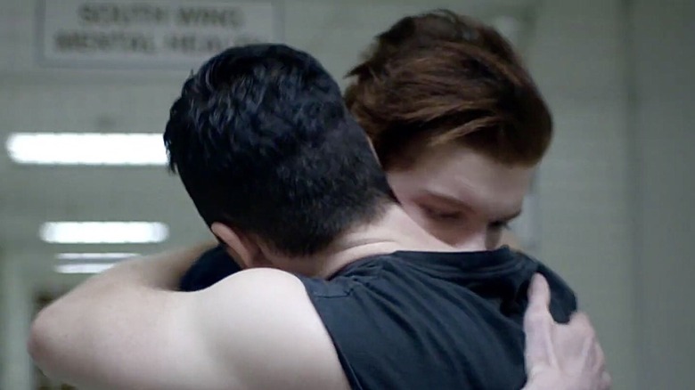 Ian and Mickey hug