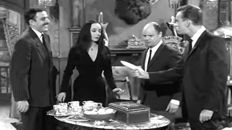 Don Rickles talking to Morticia and Gomez