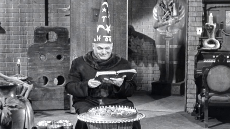 Uncle Fester wearing wizard hat