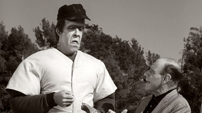 Herman Munster listening to baseball coach