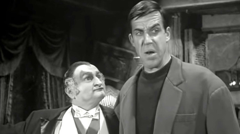 Human Herman Munster scowling