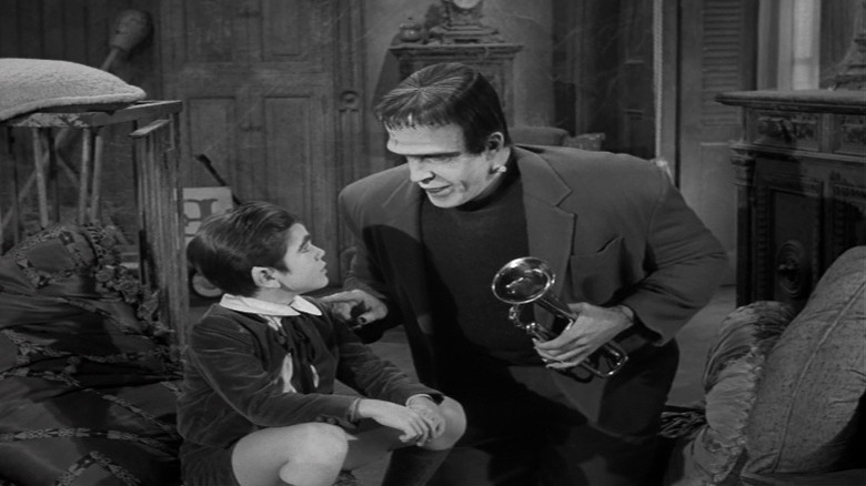 Herman Munster lecturing Eddie