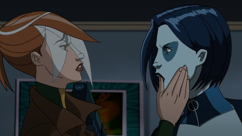 Rogue touching Domino's face