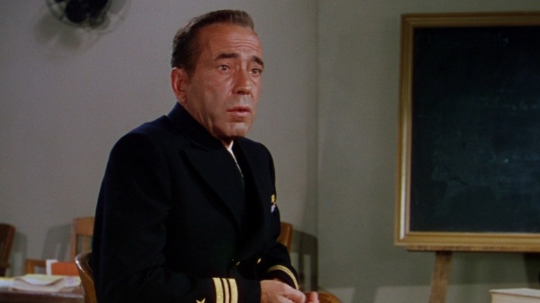 Humphrey Bogart in uniform defending himself