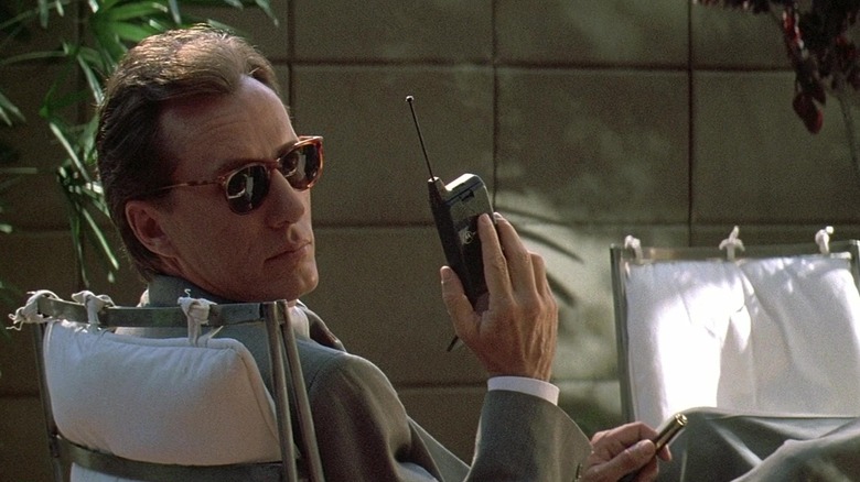 James Woods holding phone