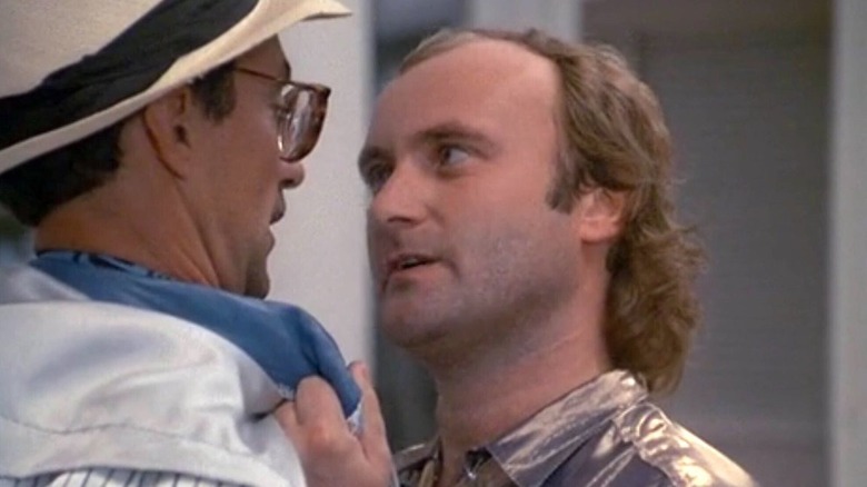 Phil Collins threatens Martin Ferrero