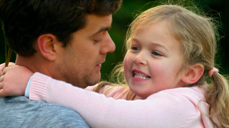 Peter holding young Etta