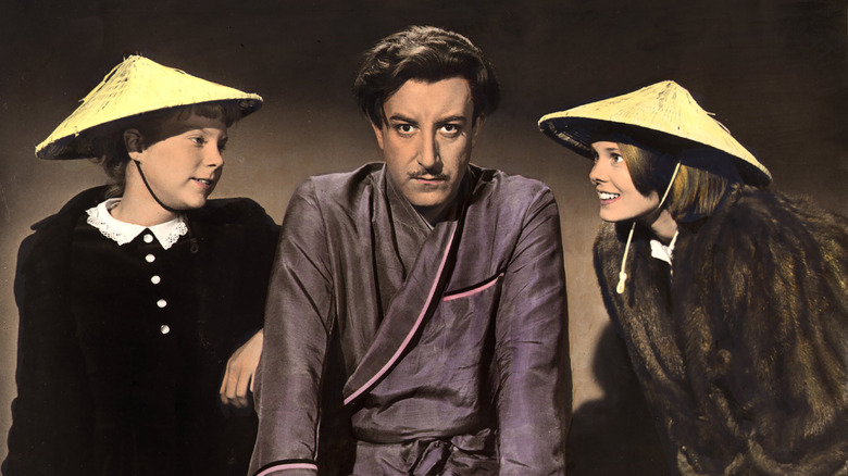 Peter Sellers wears a robe