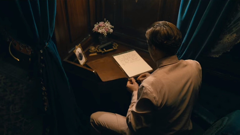 Daniel Brühl prepares to write