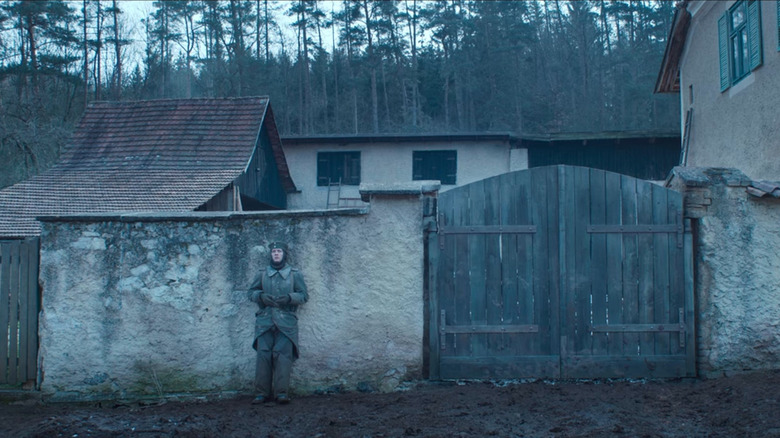 Felix Kammerer stands by gate