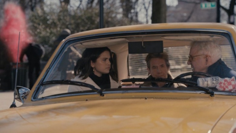 Mabel, Oliver, and Charles sitting in car