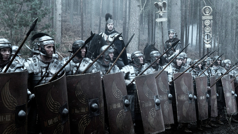 Roman soldiers getting ready for battle