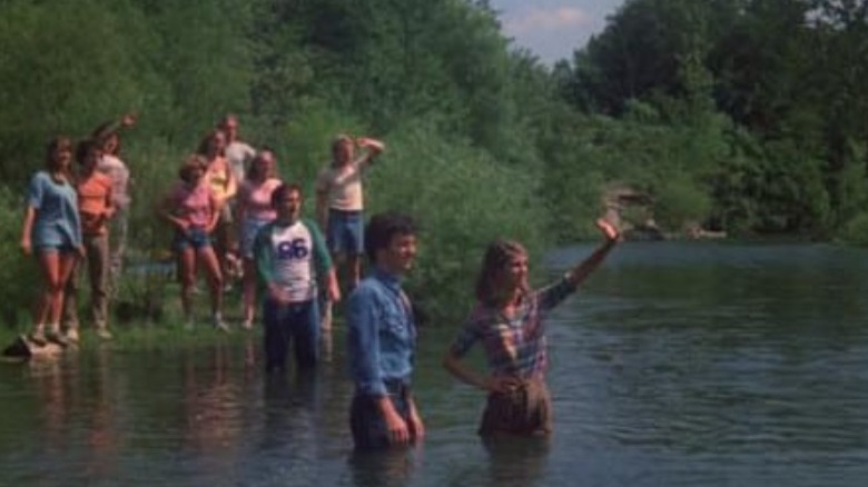 The campers enjoy the river