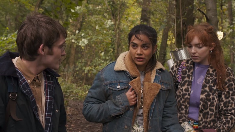 Mia and Petal talking in the woods