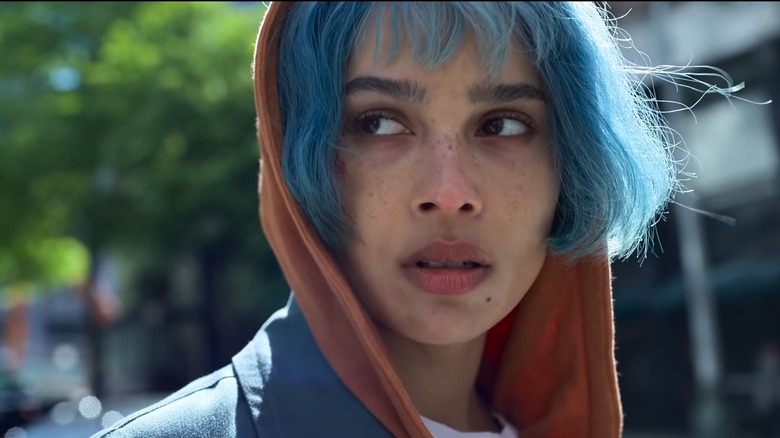 Blue-haired Zoe Kravtiz looking to the side