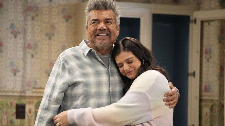 George and Mayan Lopez hugging