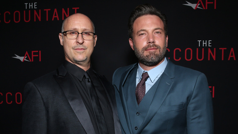 Gavin O'Connor and Ben Affleck smiling