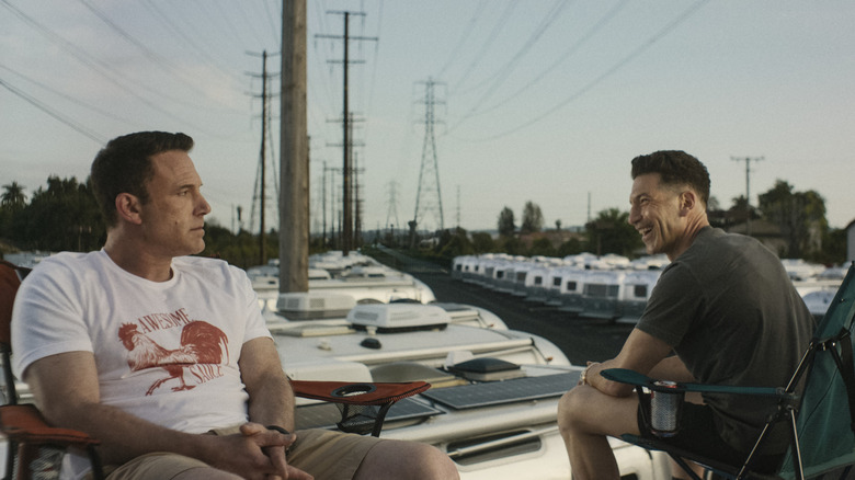 Christian and Braxton sitting on top of airstream (2025)