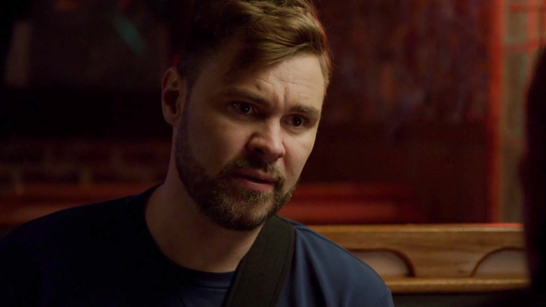 Ruzek sits in Molly's bar booth