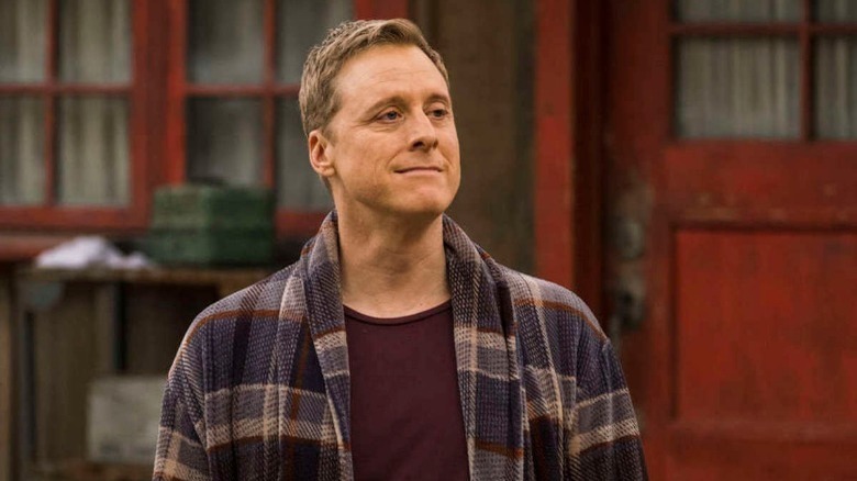 Alan Tudyk in a robe