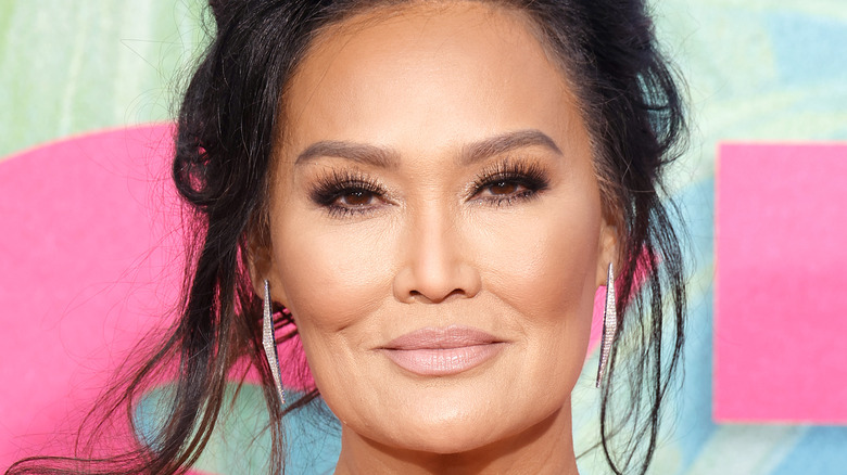 Tia Carrere smirking 