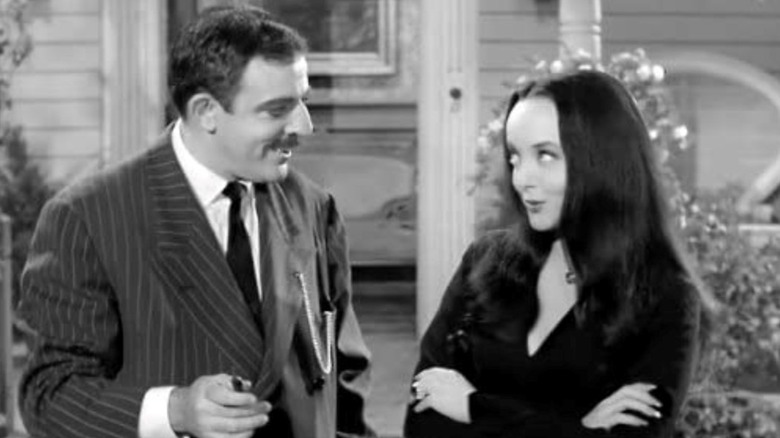 Gomez Addams speaking to Morticia