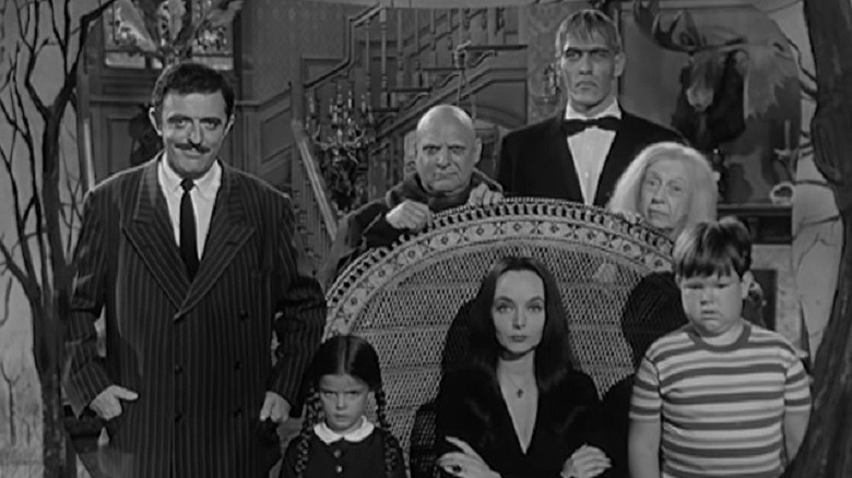 The Addams Family posing together