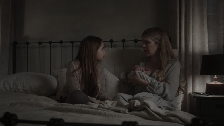 Alma and Doris converse in bed