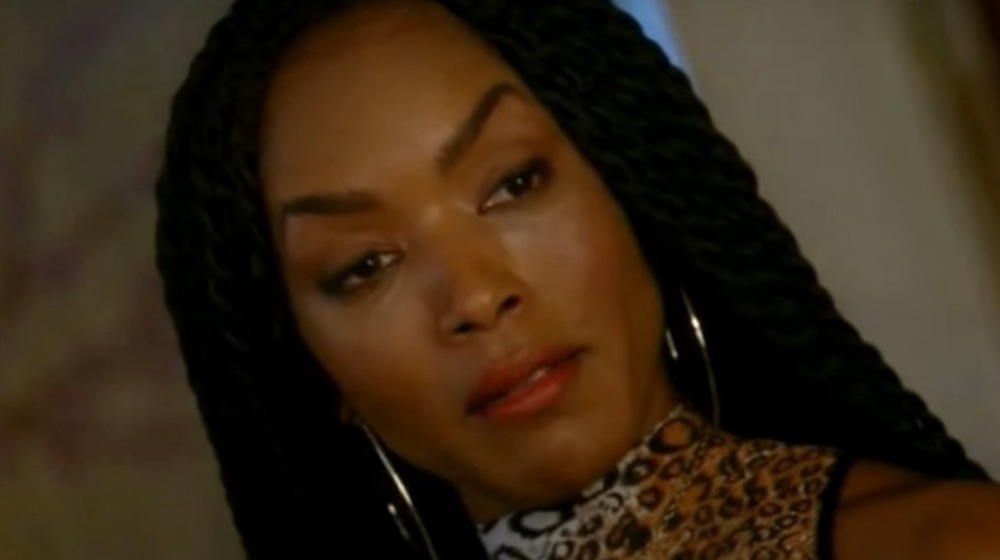 Angela Bassett as Marie Laveau