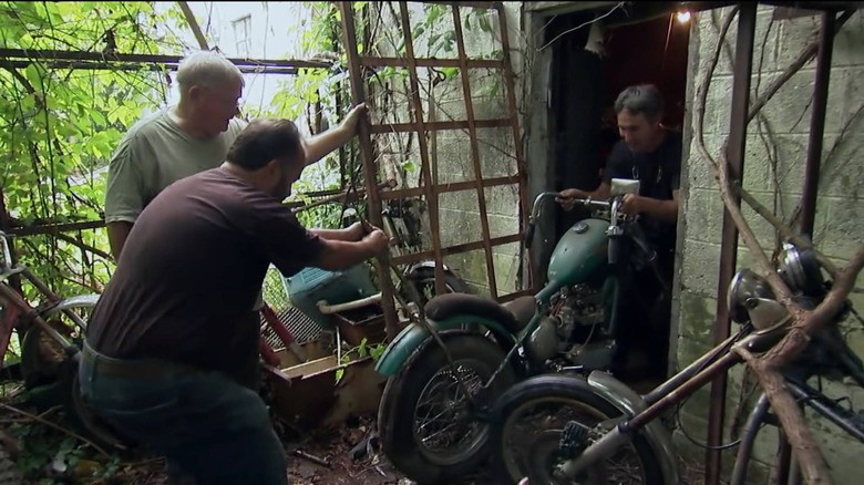 Mike Wolfe with a motorcycle