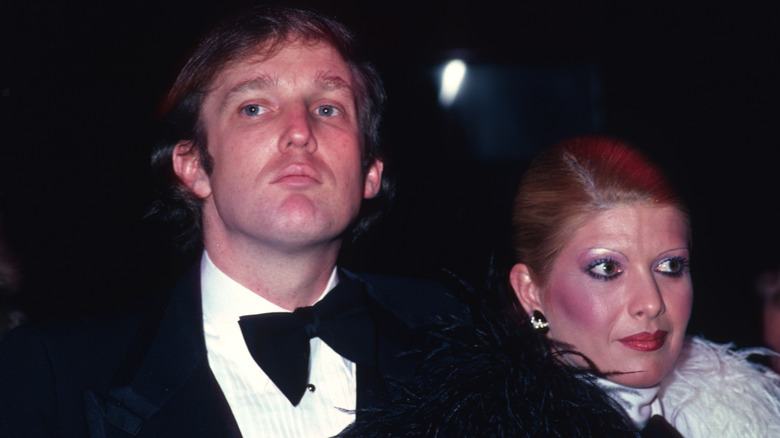 Young Donald and Ivana Trump posing