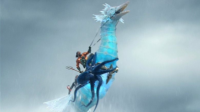 Aquaman riding a seahorse