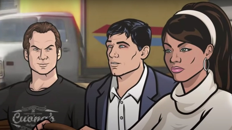 Slater, Archer, and Lana in a car