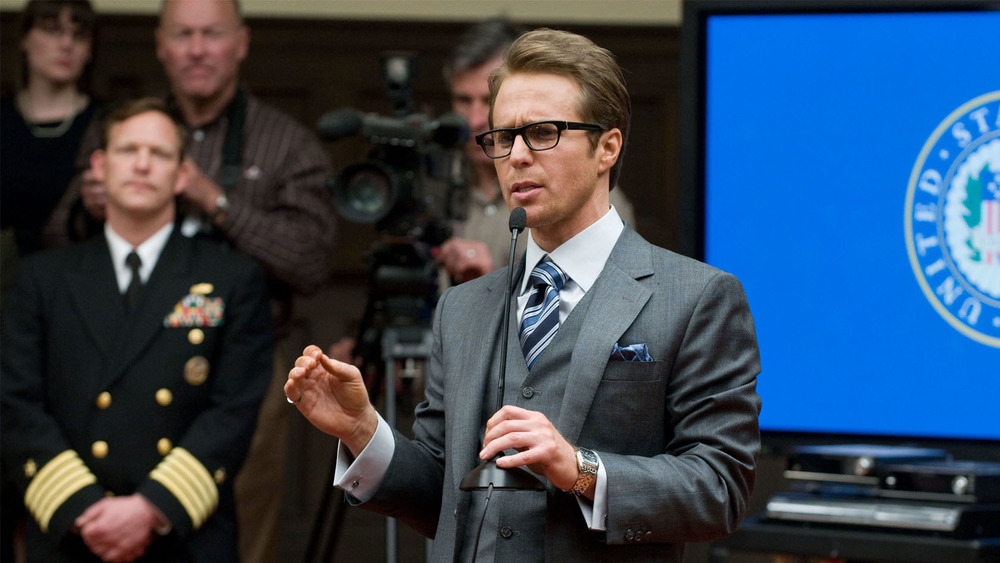 Justin Hammer giving a speech