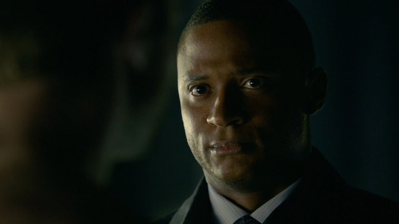 John Diggle staring