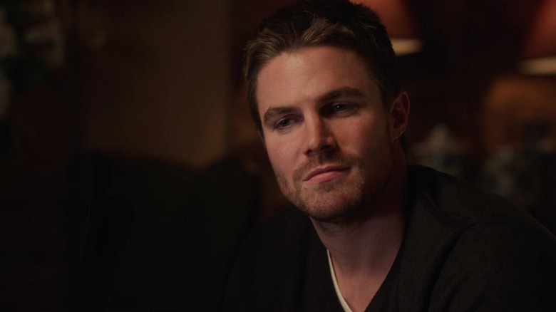 Oliver Queen contemplating