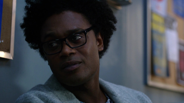 Mr. Terrific wearing glasses