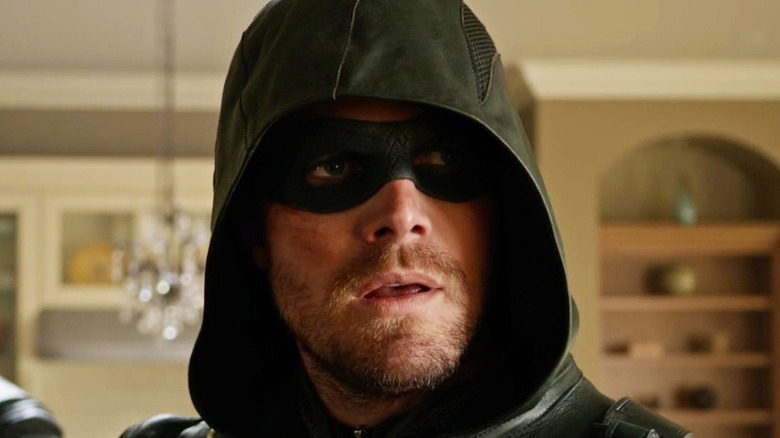 Surprised Green Arrow in mask and hood