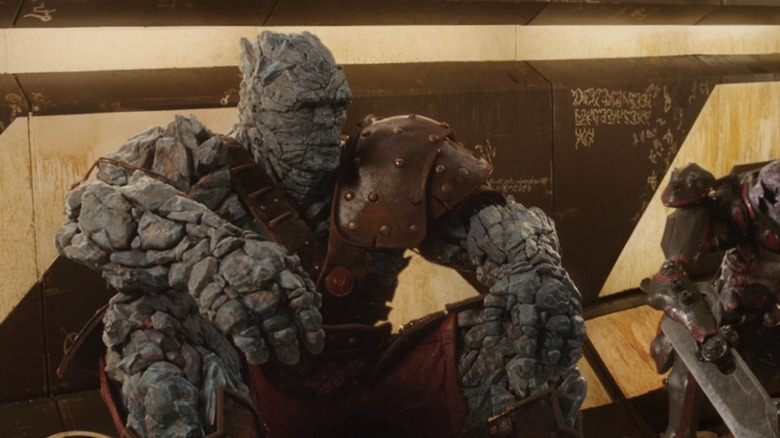 Korg sits in gladiator cell