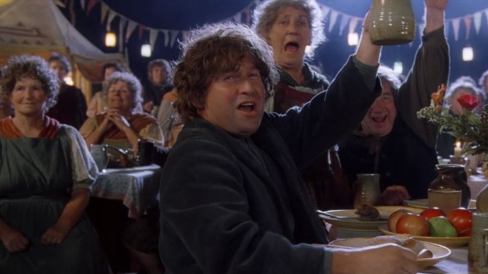 Hobbits celebrating in the Shire