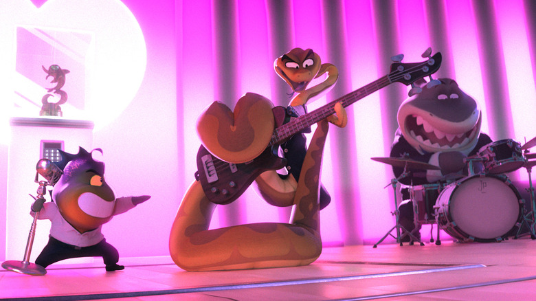 Piranha singing, Snake playing guitar, and Shark playing Drums on stage