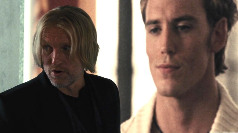 Haymitch stands next to Finnick on screen