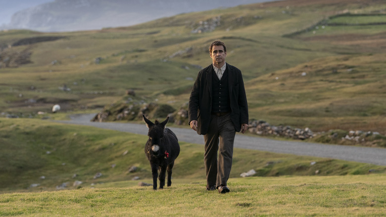 Colin Farrell with a donkey