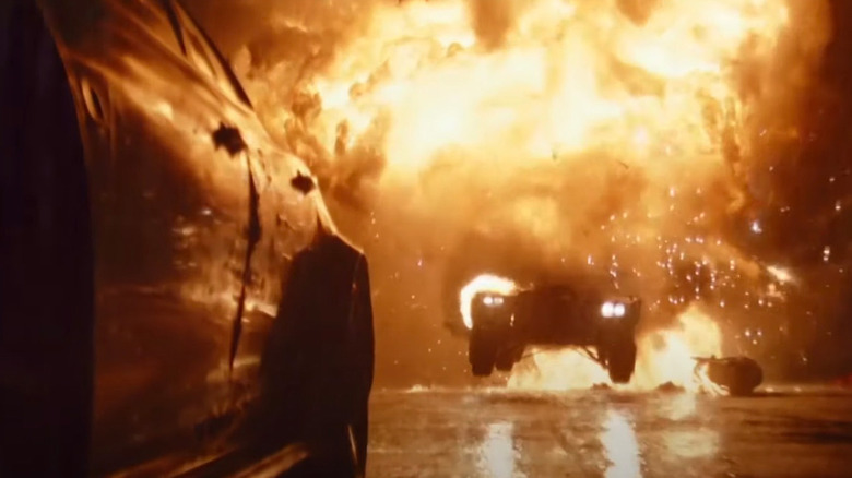 The Batmobile jumping through fire