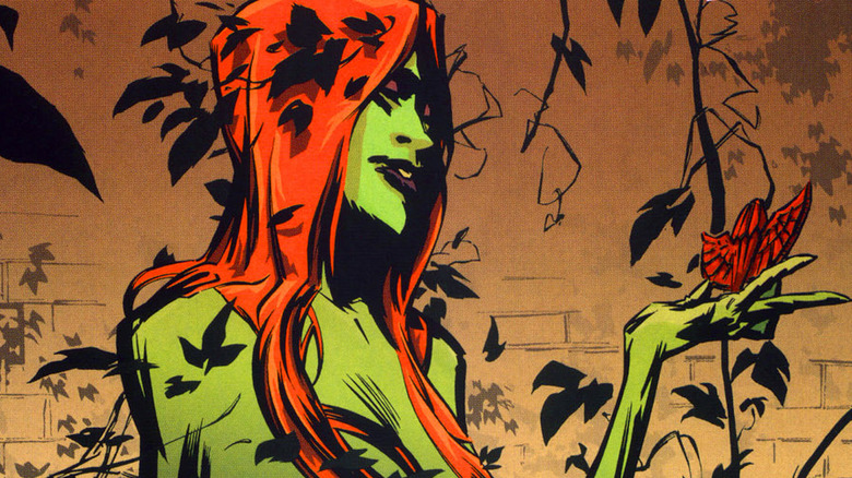 Poison Ivy holding badge