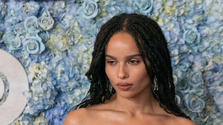 Zoe Kravitz blue flowers background