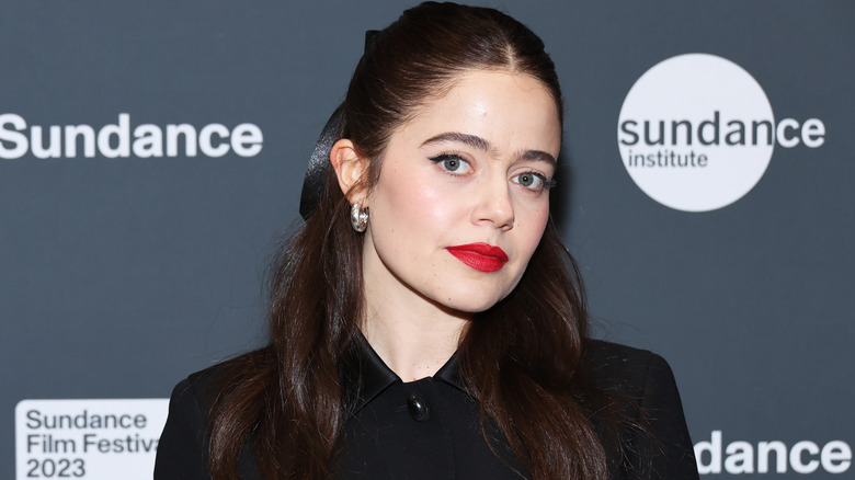 Molly Gordon red lipstick black top