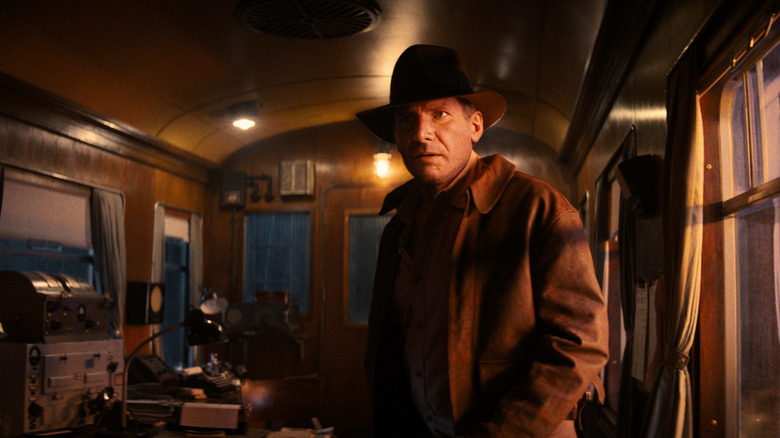 Indiana Jones standing in train