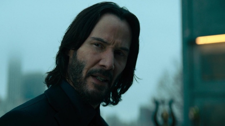 John Wick glancing over shoulder